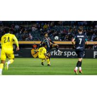Oakland Roots' Kai Greene versus New Mexico United's Mukwelle Akale