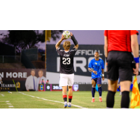 Phoenix Rising defender Ryan Flood on the throw-in