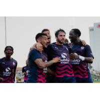 South Georgia Tormenta FC congratulate Sebastián Vivas on his goal