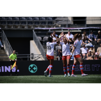 Montreal Roses celebrate a goal against Ottawa Rapid FC